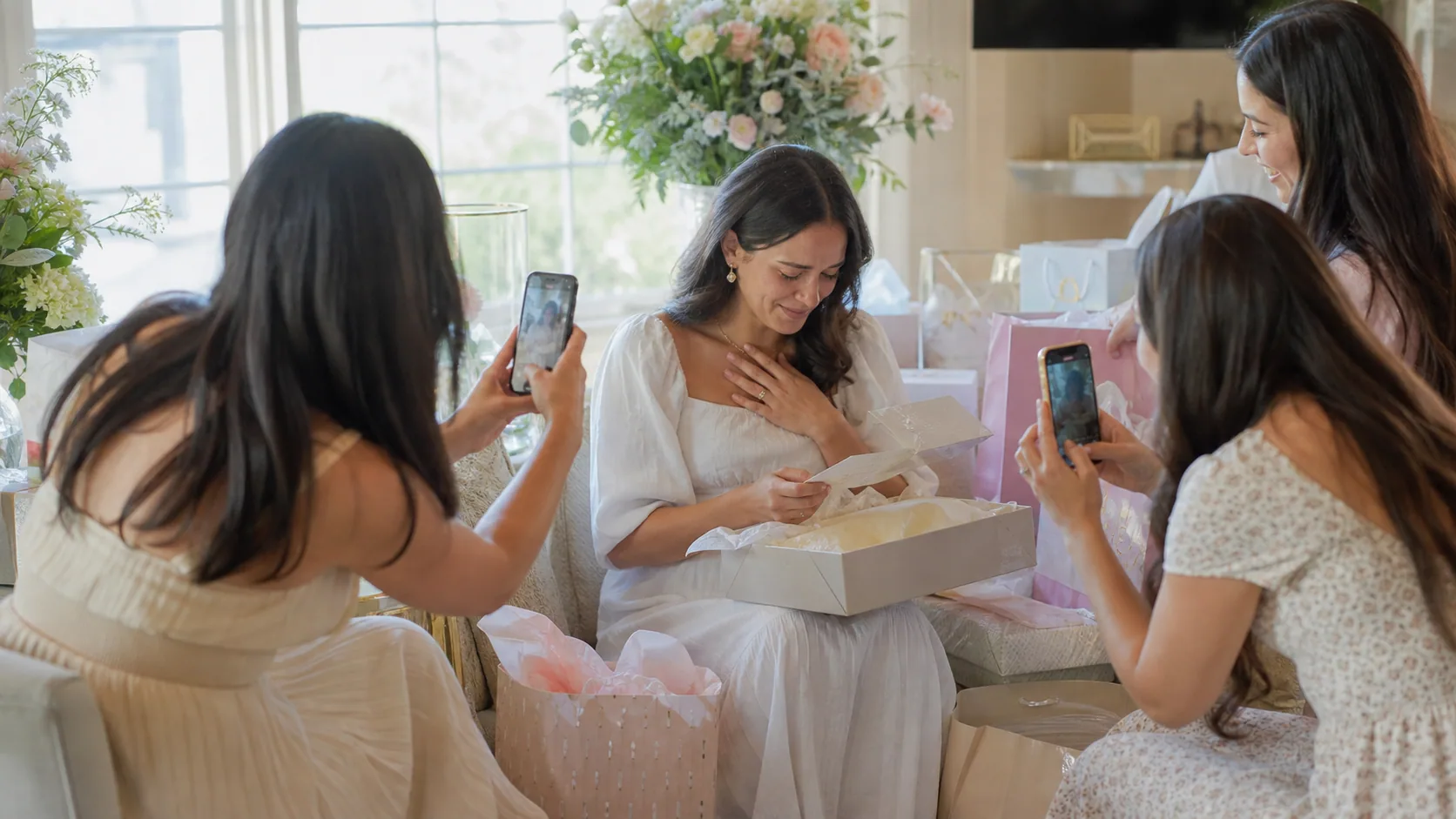 Friends capture a heartfelt bridal shower gift-opening reaction